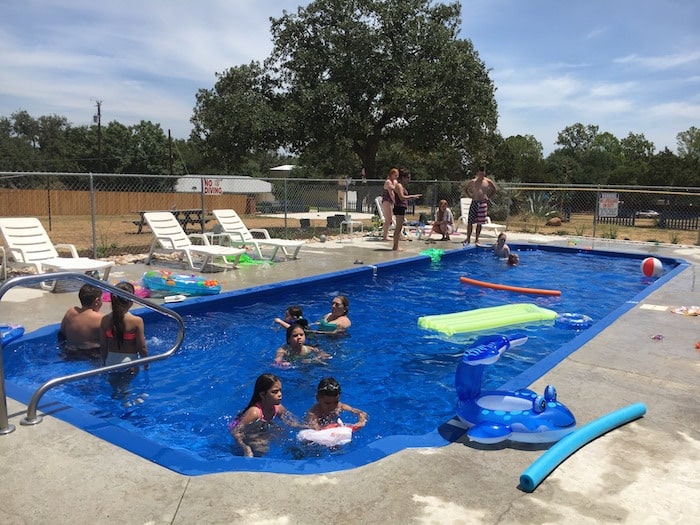 Image of guests enjoying the on-site pool during their Texas family reunion
