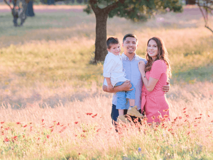 Image of a family photoshoot in the bluebonnets near Cedar Lodge Texas